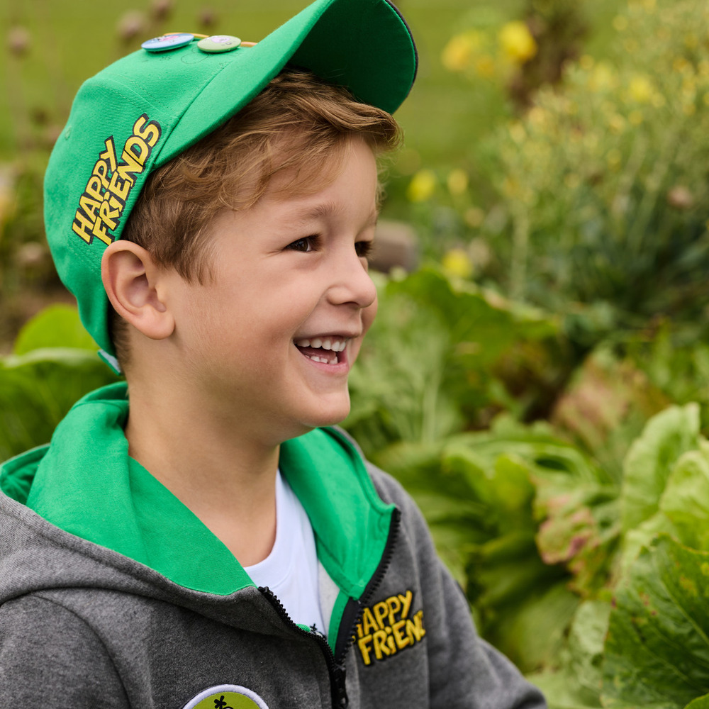Children's cap with badges